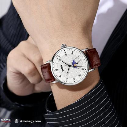 Skmei 9308: An elegant wristwatch with a modern design that combines simplicity and luxury. It features a classic round case suitable for various tastes (black & white).