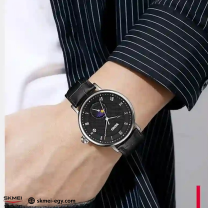 Skmei 9308: An elegant wristwatch with a modern design that combines simplicity and luxury. It features a classic round case that suits various tastes (black & black).